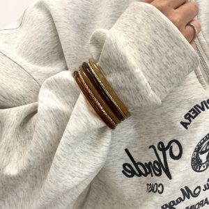 Bracelet Multi-Joncs Résine aux Détails Dorés